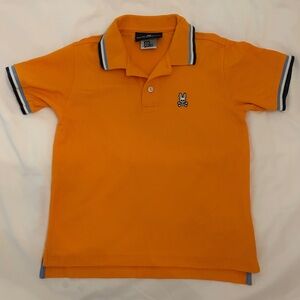 Boys orange Psycho Bunny polo shirt